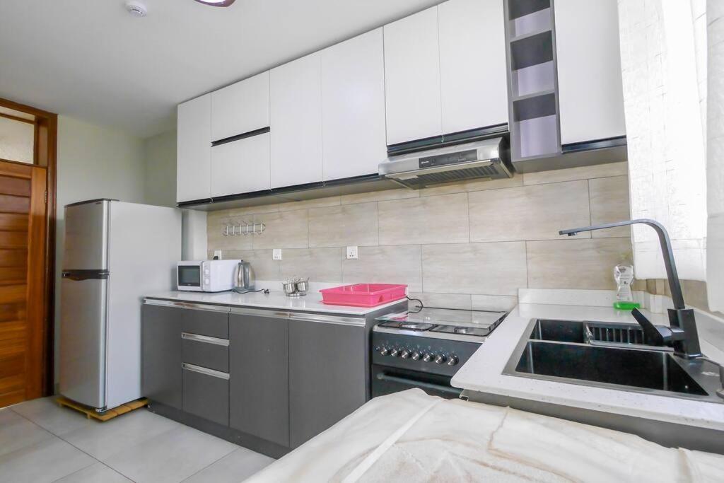 Ultra Modern Apartment In Nyarutarama Кигали Экстерьер фото
